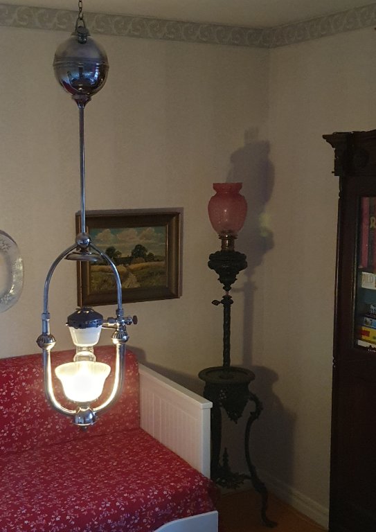 Lux Victoria lamp lit in room.jpg